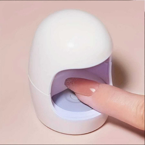 Krása - Přenosná Mini UV LED lampa na nehty